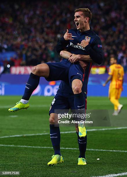 Antoine Griezmann of Atletico celebrates his team's first goal with team mate Gabi during the UEFA Champions league Quarter Final Second Leg match...