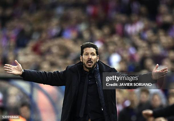 Atletico Madrid's Argentinian coach Diego Simeone gestures during the Champions League quarter-final second leg football match Club Atletico de...