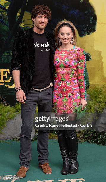 Ashley Walters and boyfriend attend the premiere of The Jungle Book at BFI IMAX on April 13, 2016 in London, England.