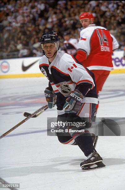 Canadian professional hockey player skates as a member of the North American All Star team at the 2000 NHL All Star Game, Air Canada Center, Toronto,...
