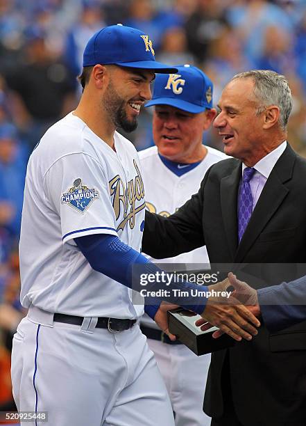 Eric Hosmer of the Kansas City Royals is congratulated by Major League Baseball Commissioner Rob Manfred after receiving his World Series...