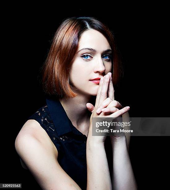 woman with hands up to face - brown hair stock pictures, royalty-free photos & images
