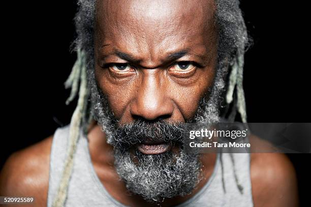portrait of older black man - tara madden stock pictures, royalty-free photos & images