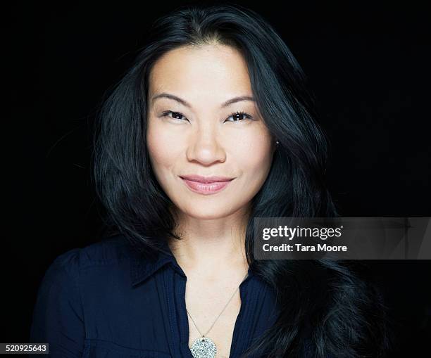 portrait of asian woman - portrait on black background stock pictures, royalty-free photos & images