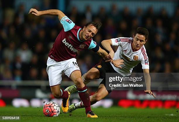 Ander Herrera of Manchester United brings down Mark Noble of West Ham United during The Emirates FA Cup, sixth round replay between West Ham United...