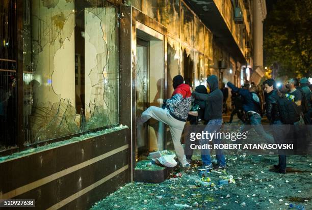 Protesters ransack the public office of President Gjorge Ivanov in Skopje on April 13 as several thousand people took the streets to demand...