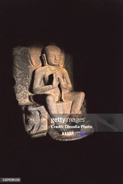 buddha statue in cave temple hinyana pandav caves first century bc to second century ad, satavahana, nasik - nasik caves stock pictures, royalty-free photos & images