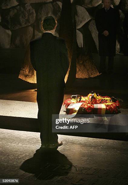 German President Horst Koehler pays his respects after laying a wreath at Jerusalem's Yad Vashem Holocaust memorial 01 February 2005, on the first...