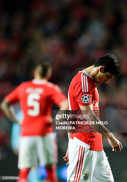 Benfica's forward Goncalo Guedes looks downwards at the end of the UEFA Champions League second-leg quarterfinal football match SL Benfica vs Bayern...