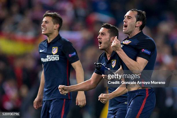 Diego Godin , Koke and Lucas Hernandez Pi of Atletico de Madrid celebrate their victory with teammates after winning the UEFA Champions League...