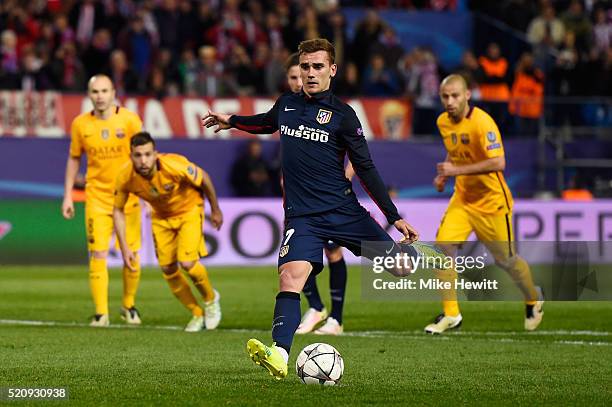 Antoine Griezmann of Atletico Madrid scores from the penalty spot for his team's second goal during the UEFA Champions League quarter final, second...