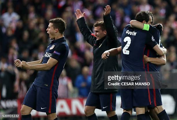 Atletico Madrid's French defender Lucas Hernandez and teammates celebrate their win during the Champions League quarter-final second leg football...