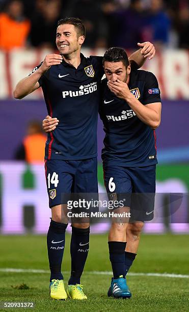 Gabi and Koke of Atletico Madrid celebrate victory after the UEFA Champions League quarter final, second leg match between Club Atletico de Madrid...