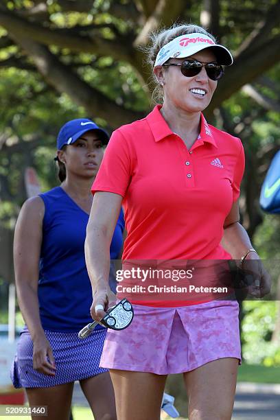 Natalie Gulbis and Cheyenne Woods walk up to the 11th tee box during the first round of the LPGA LOTTE Championship Presented By Hershey at Ko Olina...