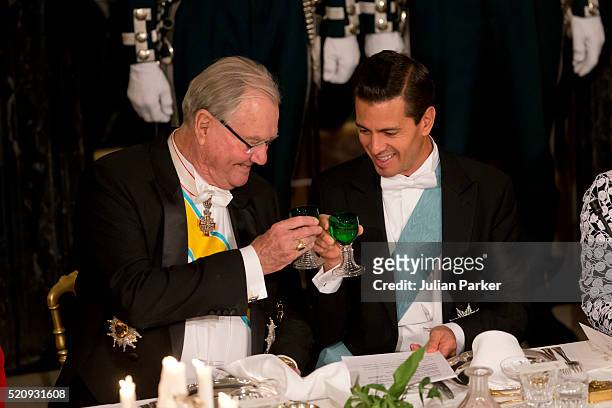 Prince Henrik of Denmark and President Enrique Pena Nieto attend a State Banquet at Fredensborg Palace on the first day of a State visit of the...