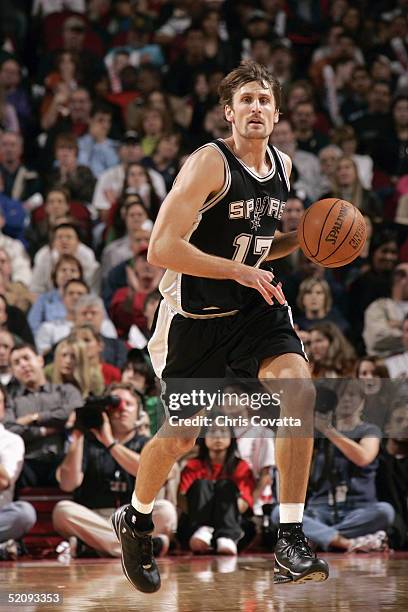 Brent Barry of the San Antonio Spurs moves the ball against the Houston Rockets on January 15, 2005 at the Toyota Center in Houston, Texas. The...