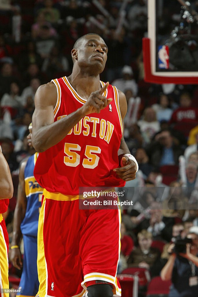 Mutamba Houston Rockets Dikembe Mutombo of the Houston Rockets stands on the court during the ...