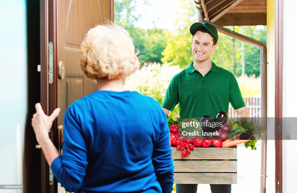Delivery man with organic food