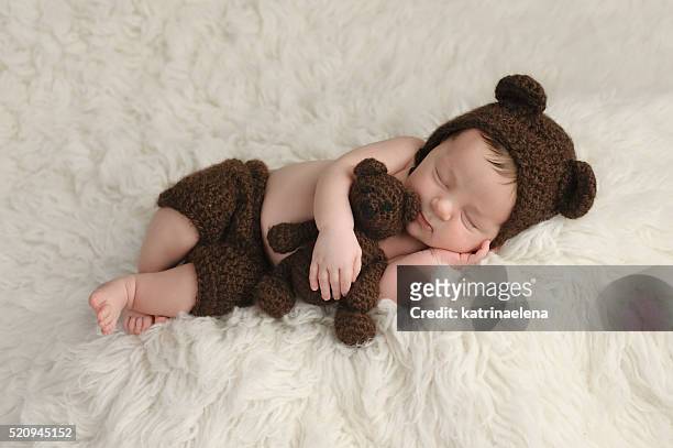 Newborn Baby Boy with Bear Hat and Toy