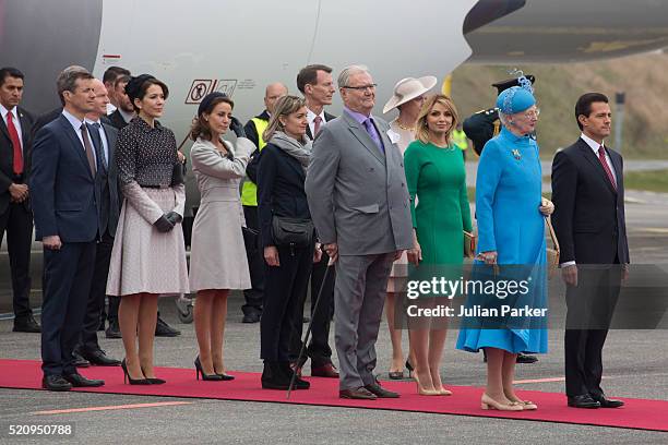 Queen Margrethe of Denmark with President Enrique Pena Nieto, and his wife , and members of The Danish Royal Family at Copenhagen Airport, during the...