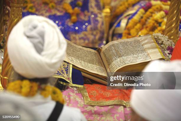 celebrations consecration of perpetual guru granth sahib sikh, sachkhand saheb gurudwara in nanded - guru granth sahib foto e immagini stock