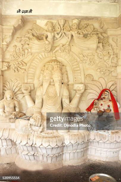 statue of god brahma, hall of gods, mandore, jodhpur, rajasthan, india - brama stock pictures, royalty-free photos & images