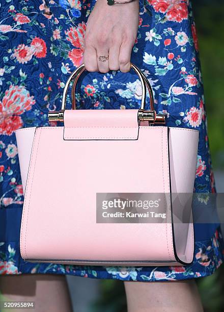 Ashley James, bag detail, arrives for the European premiere of "The Jungle Book" at BFI IMAX on April 13, 2016 in London, England.