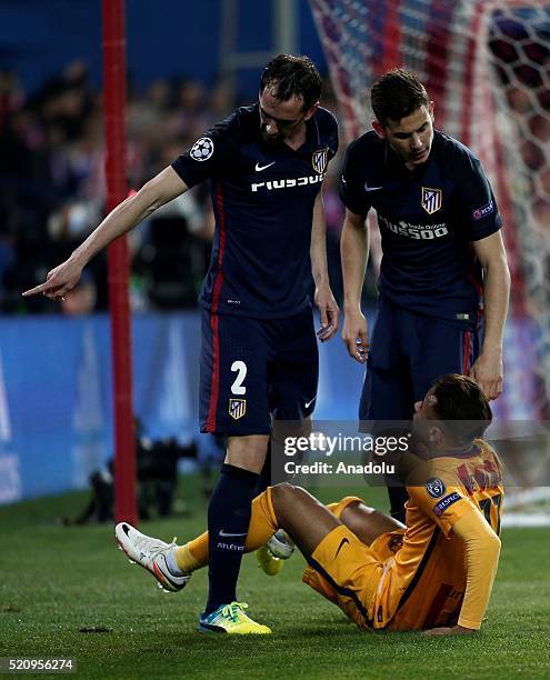 Neymar of Barcelona argues with Diego Godin of Club Atletico de Madrid during the UEFA Champions League quarter final second leg match between Club...