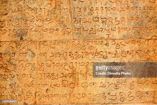 tamil inscription on wall at brihadeshwara temple, thanjavur, tamil nadu, india - tamil ストックフォトと画像