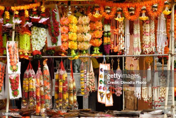 colourful garlands artificial flowers beads pearls decorate idols of lord ganesh, ganapati festival, dadar, bombay mumbai - mumbai india stock pictures, royalty-free photos & images