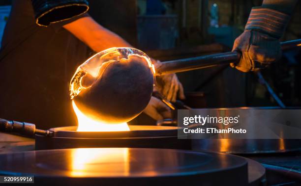 traditional glass making / glass blowing - manualidades fotografías e imágenes de stock