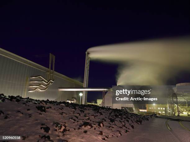 svartsengi geothermal power plant at night - svartsengi stock pictures, royalty-free photos & images