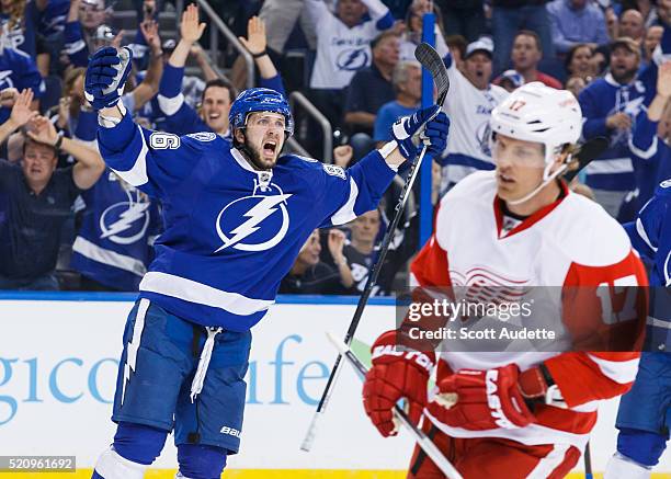 Nikita Kucherov of the Tampa Bay Lightning celebrates his goal against Brad Richards and the Detroit Red Wings during the first period of Game One of...