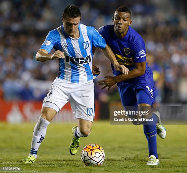 Ivan Pillud of Racing Club fights for the ball with Frank Fabra of Boca Juniors during a match between Racing and Boca Juniors as part of Copa...