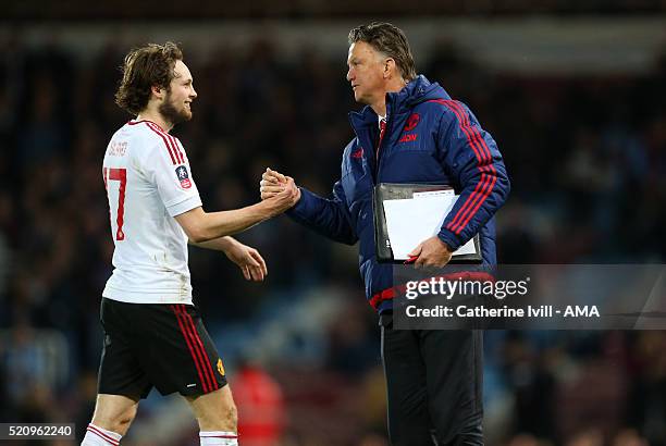 Louis van Gaal Manager of Manchester United and Daly Blind of Manchester United after the Emirates FA Cup Sixth Round Replay match between West Ham...