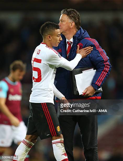 Louis van Gaal Manager of Manchester United and Jesse Lingard of Manchester United after the Emirates FA Cup Sixth Round Replay match between West...