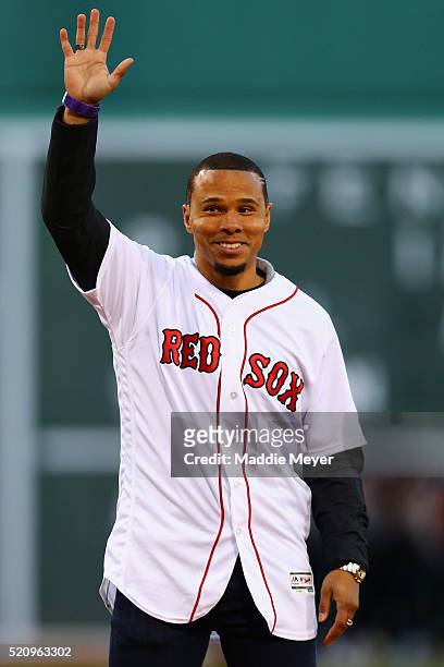Charlie Davies of the New England Revolution acknowledges the crowd before the game between the Boston Red Sox and the Baltimore Orioles at Fenway...