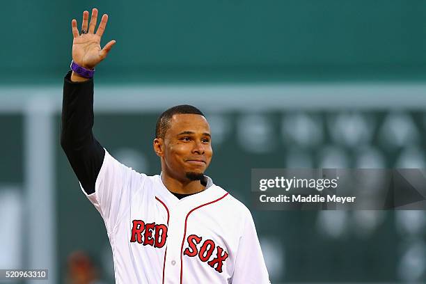 Charlie Davies of the New England Revolution acknowledges the crowd before the game between the Boston Red Sox and the Baltimore Orioles at Fenway...