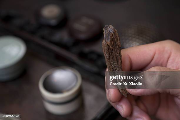 chinese traditional agarwood ceremony - oud stock pictures, royalty-free photos & images