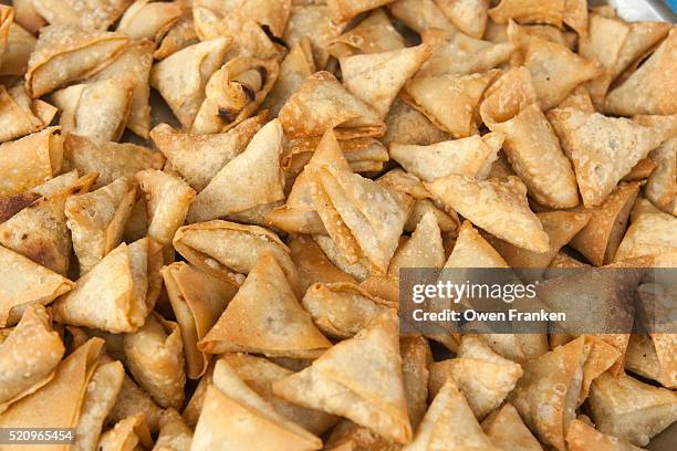 samosas, a fried snack - samosa stock pictures, royalty-free photos & images