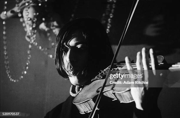 John Cale of the Velvet Underground performs on stage at the New York Society for Clinical Psychiatry annual dinner, The Delmonico Hotel, New York,...