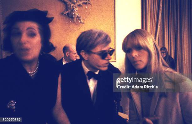 Nico of the Velvet Underground with artist and manager Andy Warhol at the New York Society for Clinical Psychiatry annual dinner, The Delmonico...