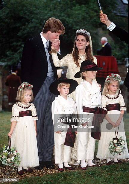 Viscount Althorp Kissing The Hand Of Bride, Victoria Lockwood. Bridesmaids And Pageboys Eleanor Fellowes, Prince Harry, Alexander Fellowes Emily...