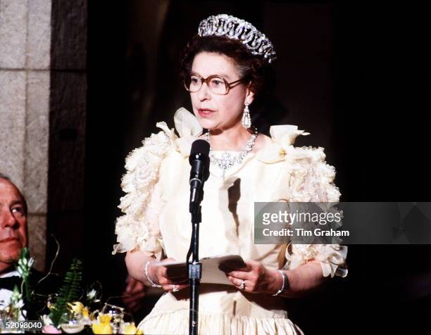 The Queen Makes A Speech At A Banquet At The De Young Museum Wearing A Dress With Bows And Frills