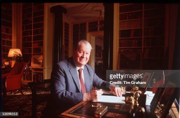 Earl Spencer At His Desk At Home In Althorp House In Northamptonshire. On His Desk Is A Photograph Of His Daughter, Princess Diana,princess Of Wales.