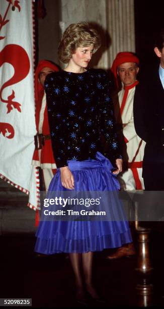 Princess Diana During Her Official Tour Offlorence In Italy Wearing A Blue And Black Knee-length Evening Dress Designed By Jacques Azagury. The Dress...