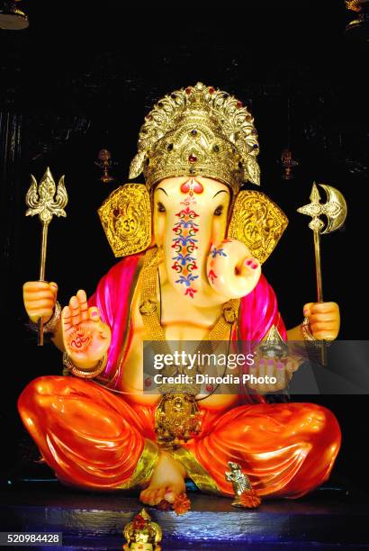 idol of lord ganesh in ganpati festival, pune, maharashtra, india - ganesha ストックフォトと画像