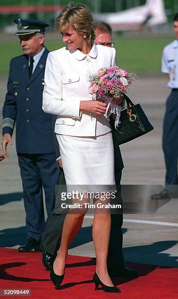 Princess Diana Arriving At Buenos Aires Airport For Her Historic Visit To Argentina. The Princess Is Wearing A White Suit Designed By Fashion...