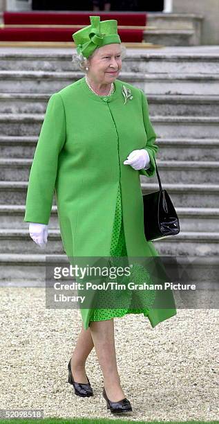 The Queen In The Gardens Of Buckingham Palace, London, Attending The First Of Her Annual Garden Parties.