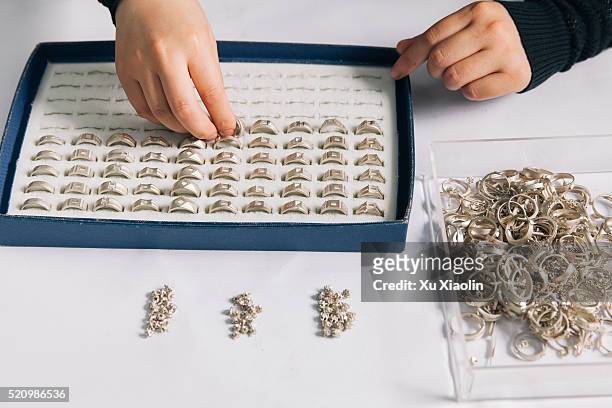 chinese diamond industry - jeweller stock pictures, royalty-free photos & images